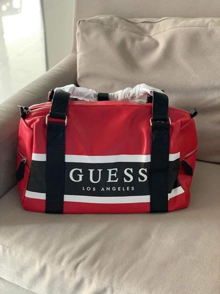 Guess travel bag, Women's Fashion, Bags & Wallets, Tote Bags on Carousell