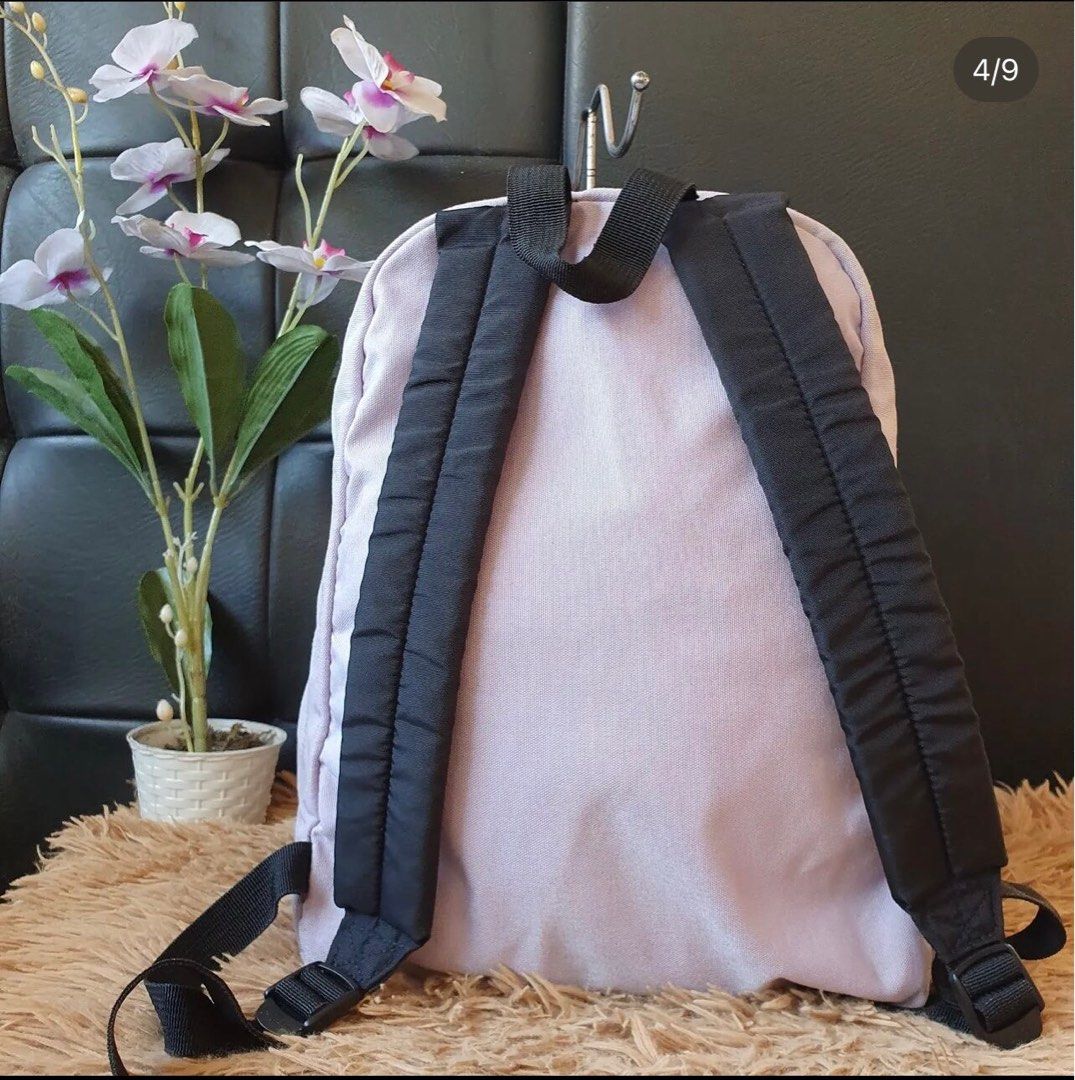 Jansport Lavender Backpack (Category: Backpacks) located in Quezon City. Submitted by ksy27 (Listing ID 1225051509, Image 3). Description: Authentic Store bought Very good used condition No holes or tears This is a preloved item, please manage your expectations. Only major flaws will be disclosed. Flaws: needs minor cleaning due to storage RFS: Downsizing my bag collection Pick up/checking of item is allowed in Xavierville in Quezon City. No othe