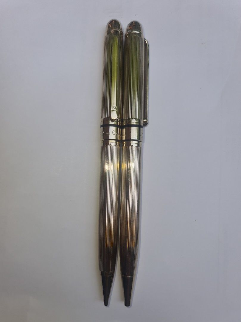 Pierre Cardin pens (Category: Luxury Accessories) located in Makati City. Submitted by harvesting_game (Listing ID 1224927008, Image 3). Description: 1 gold-electroplated pen and 1 gold-electroplated pencil by Pierre Cardin. Never used. Just stored. Guaranteed Authentic and Original. No box though as the items were to be used but for some reason the owner never got around to using them. Still writes! Perfect gift for anyone!.