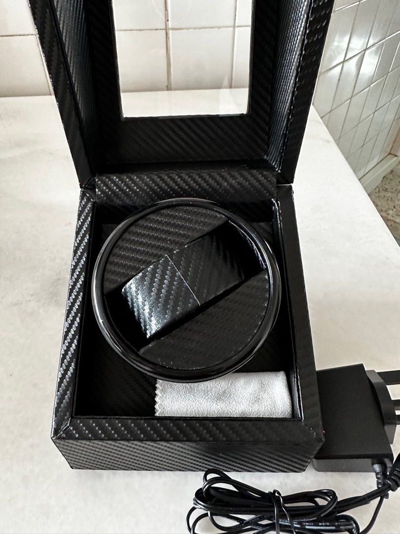 Watch cheap holder rotating