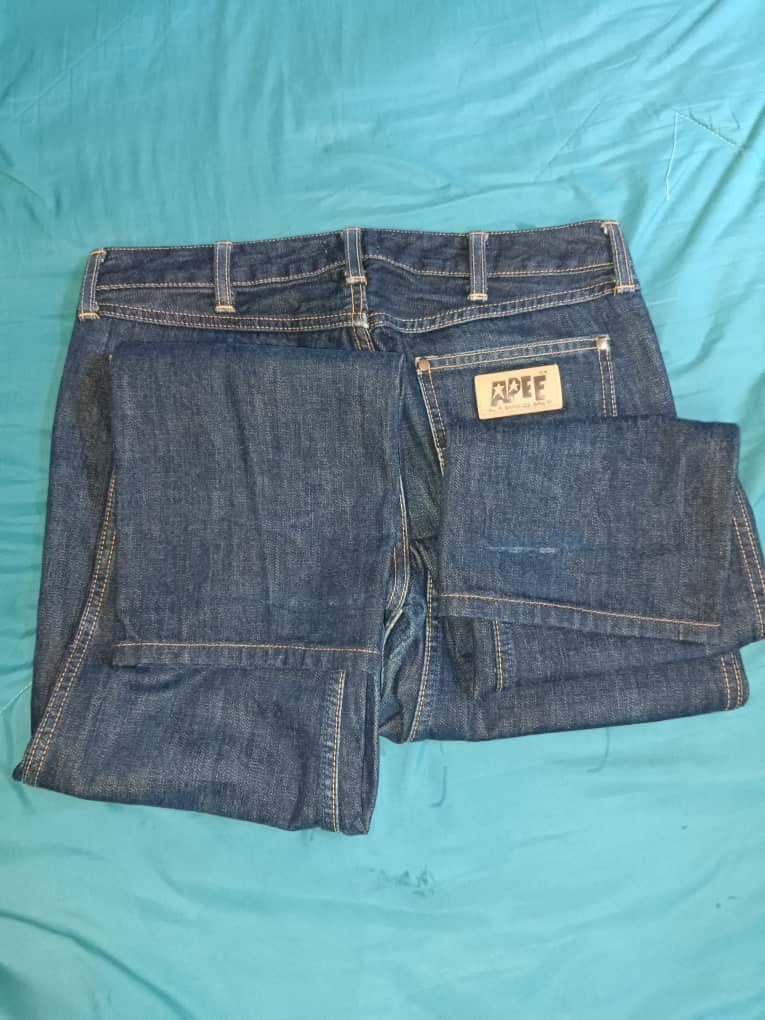A Bathing Ape (Category: Jeans & Leggings) located in Tanah Merah. Submitted by pejablack (Listing ID 1225270021, Image 1). Description: A Bathing Ape Denim Pants -MADE IN JAPAN -SIZE 32 LBUH 37.5 -CAWAT 11 PAHA 20 KAKI 14 -KONDISI HARI RAYA.