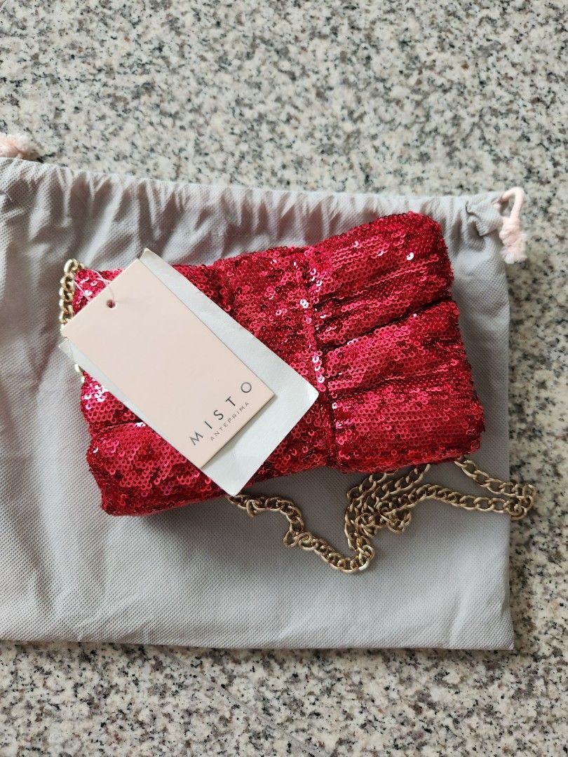 Red online sequin clutch