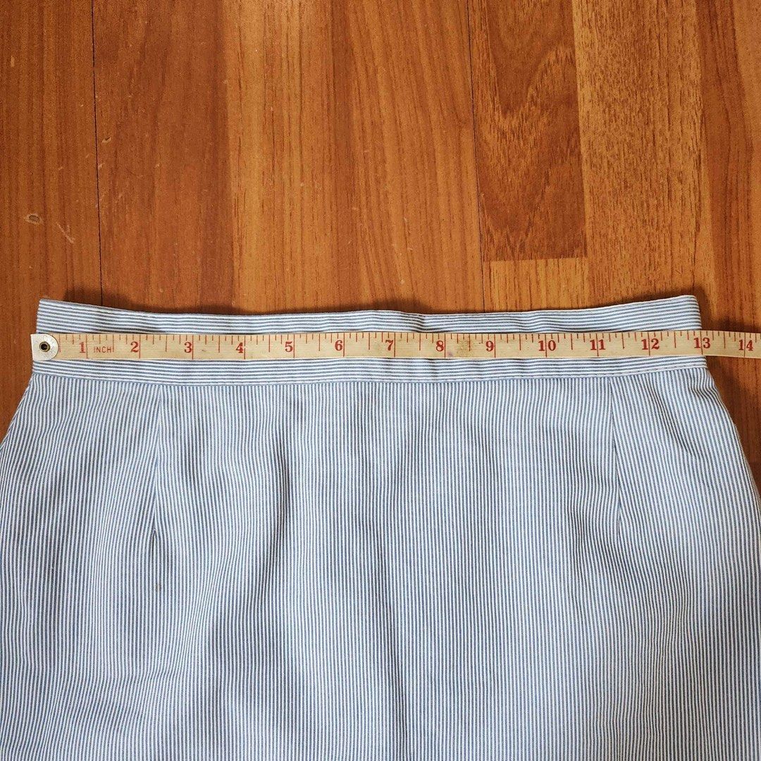 Blue Stripe Straight Office Skirt (Category: Skirts) located in Marikina City. Submitted by bodegadiaries (Listing ID 1225223159, Image 3). Description: Info: - FREE with purchase of other listings 350 and up (just indicate in chat to claim!) - see last pics for dimes - has two small stains, has holes in lining but could be removed and still wearable MOP: - BPI / GCash Courier: - Gogoexpress / J&T / Lalamove - Shipping fee c/o Buyer PS: - Clothes