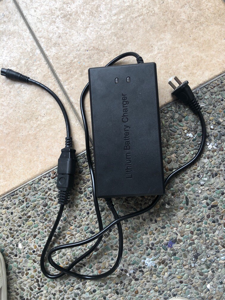 escooter charger, Computers & Tech, Parts & Accessories, Other Accessories  on Carousell