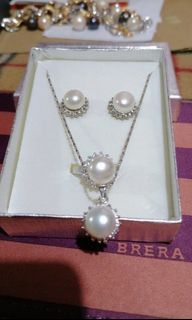 Fresh water pearl set of necklace, ring and earrings.