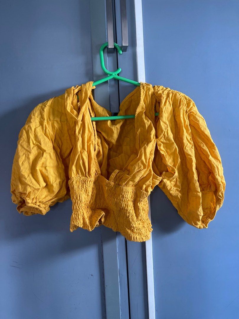 YELLOW BELL SLEEVES TOP - UNUSED (Category: Blouses) located in Paranaque City. Submitted by only.cece (Listing ID 1225183141, Image 2). Description: NEW Shirred Puff Sleeve Top - Mustard Yellow - Purchased straight from SHEIN ☑️BRAND NEW (HINDI LANG IRONED) ☑️ LINEN FABRIC, very pretty ☑️Only worn for fitting ☑️ Garterized Waist ☑️ Garterized end of puffy sleeves ☑️Fits Small to medium girls ☑️FOR REFERENCE: My height is 5'5 ⭕️RFS: size is too s
