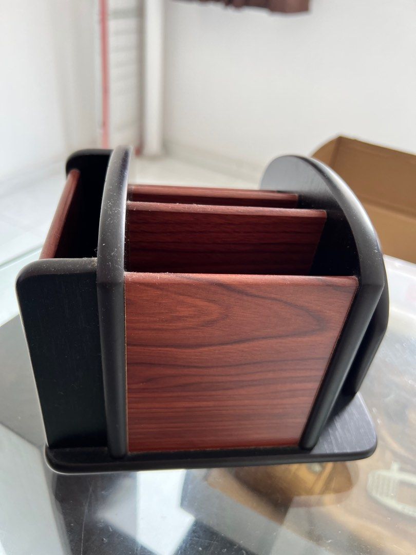 Rotatable remote control holder holds multiple remotes, Furniture