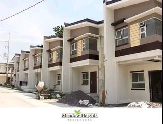 Single attached 3 Bedroom Meadow Heights in Batasan Quezon City beside Filinvest bear Ever Gotesco Commonwealth