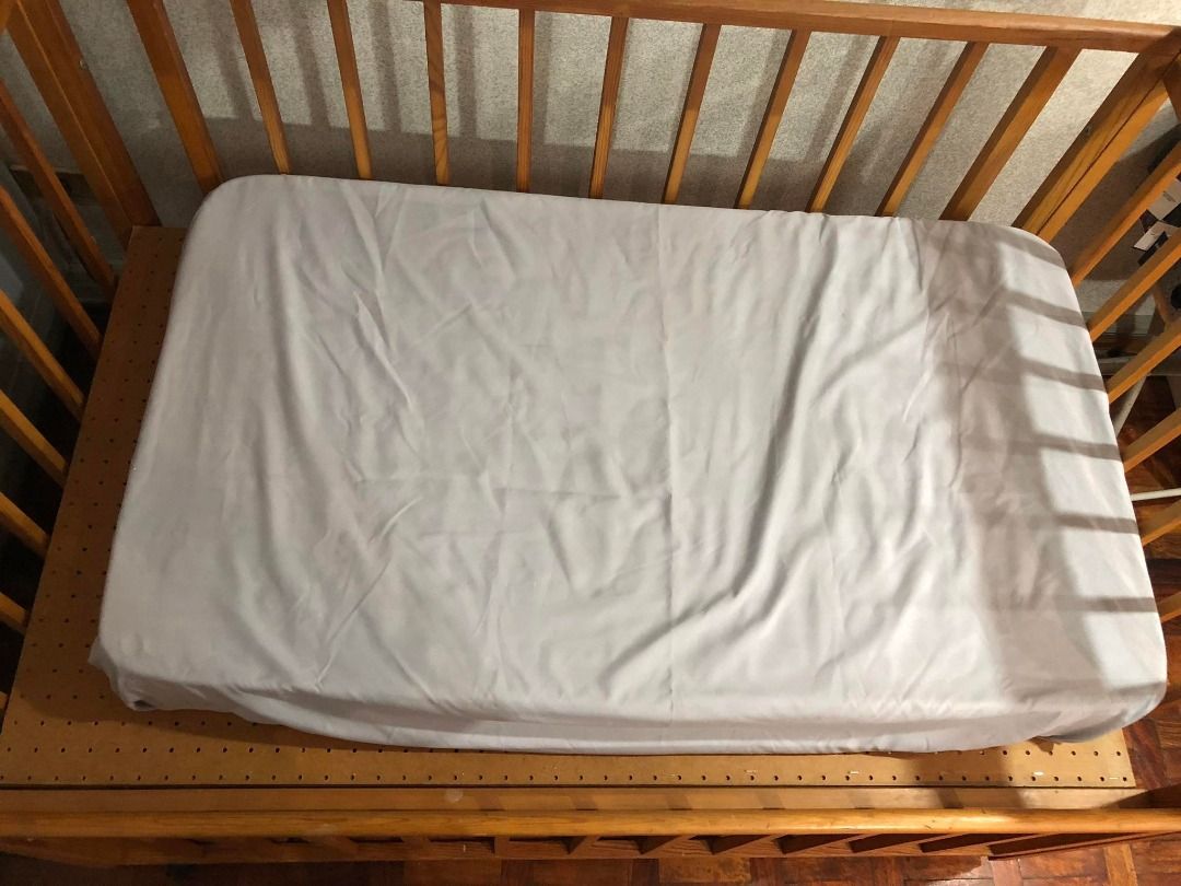 How thick is a crib best sale mattress