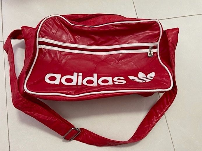 Red adidas side best sale bag
