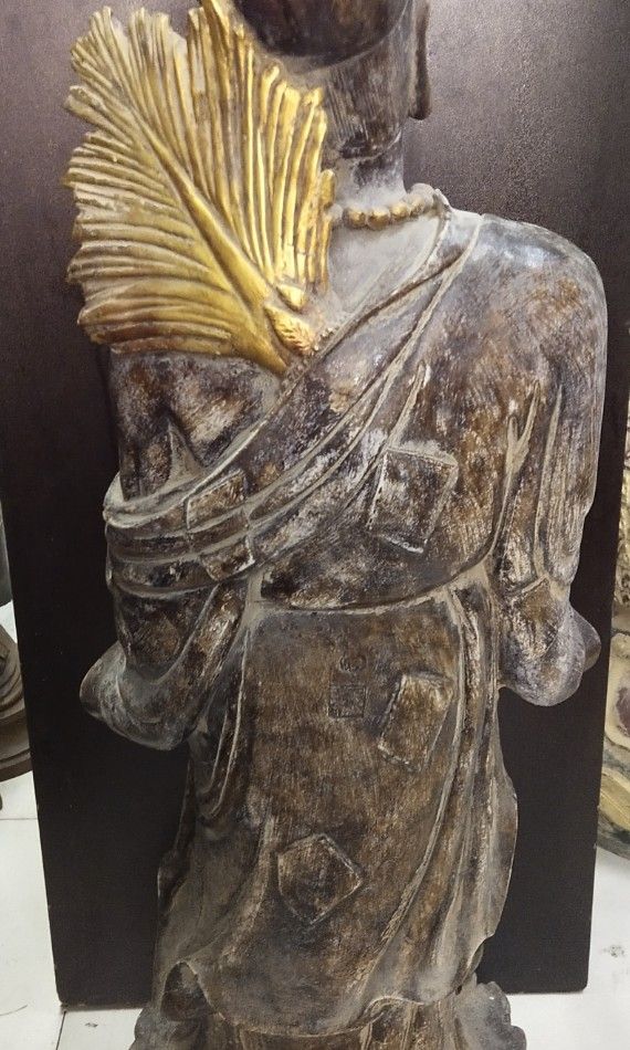 Vintage stone God statue at the temple cave on Carousell