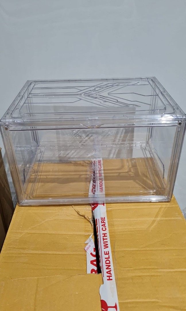 Clear perspex shoe boxes shop