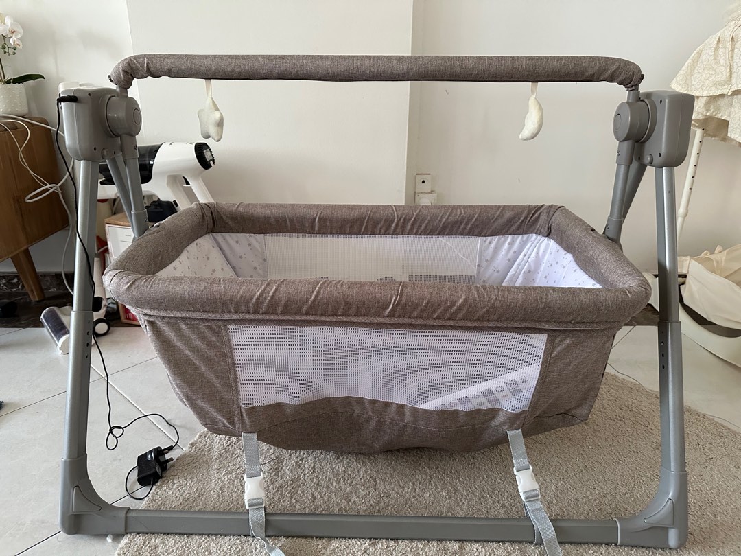 Electric rocking bassinet hotsell