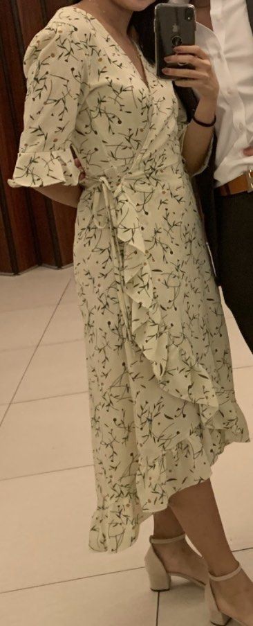 Beige Wrap Around Floral Dress (Category: Dresses) located in Quezon City. Submitted by tishaagba (Listing ID 1225532193, Image 3). Description: .