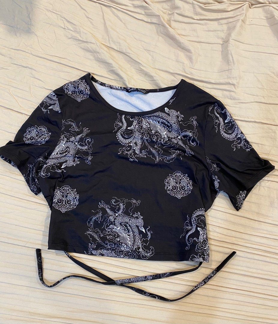 SHEIN Black Dragon Backless Crop Top SHEIN (Category: Others Tops) located in Quezon City. Submitted by matrove (Listing ID 1225600085, Image 3). Description: Condition: 10/10! Size: XS-M Brand New, w/ Shein Pouch Nice Fabric Msg me for details and questions.