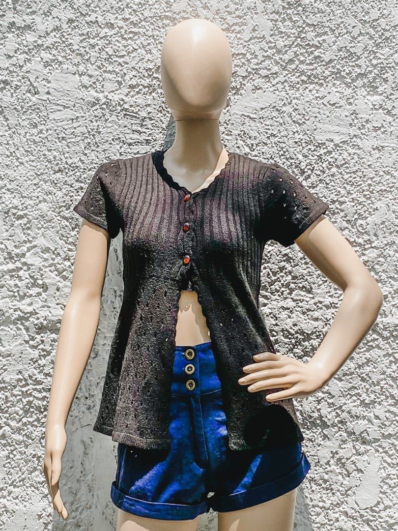 Black knit beach cover up / top (Category: Sleeveless) located in Quezon City. Submitted by mommake (Listing ID 1225620264, Image 3). Description: - So cute as a beach cover up or as a top! - Good fit for sizes XS-S - Third photo overexposed to show the details of the top - Fit on mannequin is as is, no pins or clips at the back - Shipping c/of buyer, item can be shipped from QC, Ortigas, or Makati, can also ship via Flash Express, no Shopee chec