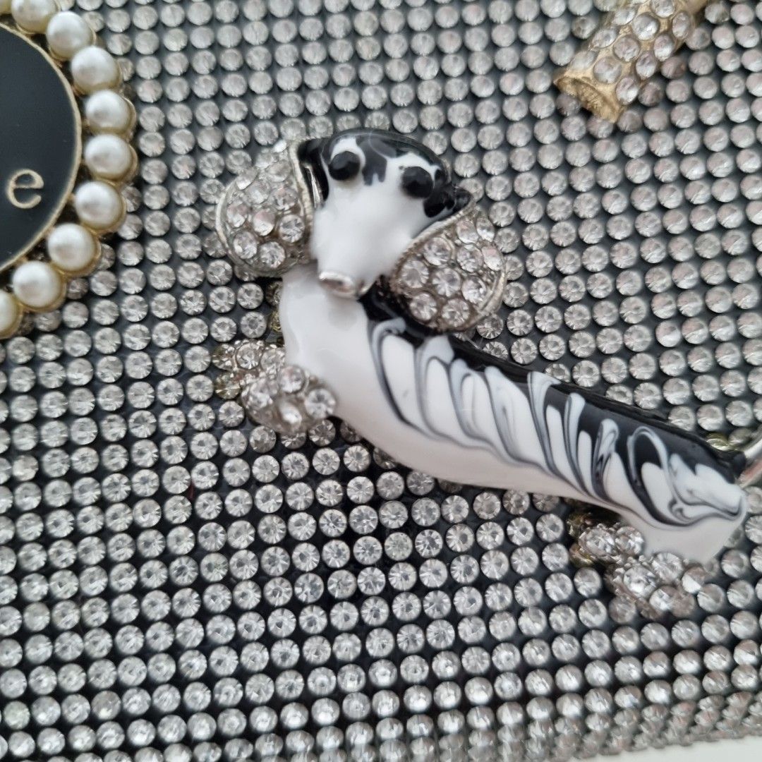Brand new crystal card holder (Category: Wallets & Card holders) located in Taguig. Submitted by rochev (Listing ID 1225566949, Image 2). Description: This is a brand new cardholder. Can be zipped. Design is quirky. All crystals are intact. Can slot in quite a number of cards..