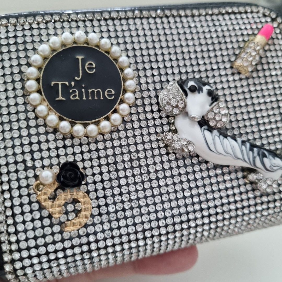 Brand new crystal card holder (Category: Wallets & Card holders) located in Taguig. Submitted by rochev (Listing ID 1225566949, Image 3). Description: This is a brand new cardholder. Can be zipped. Design is quirky. All crystals are intact. Can slot in quite a number of cards..