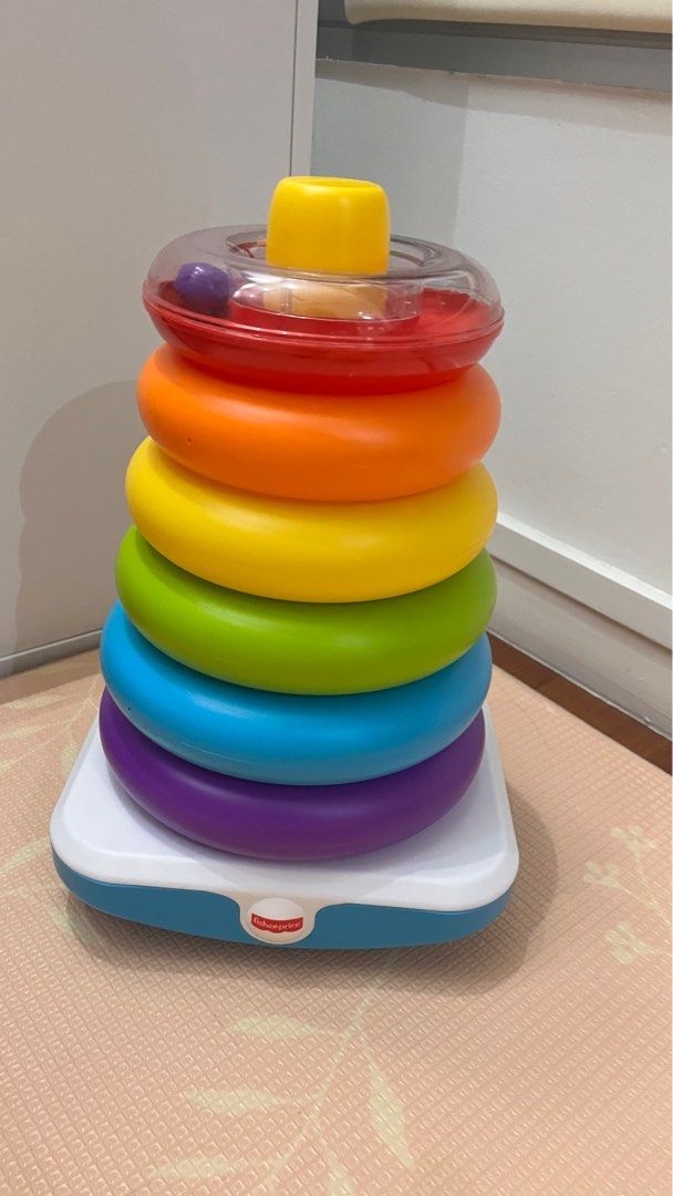 Fisher price stacking rings donuts, Babies & Kids, Infant Playtime on