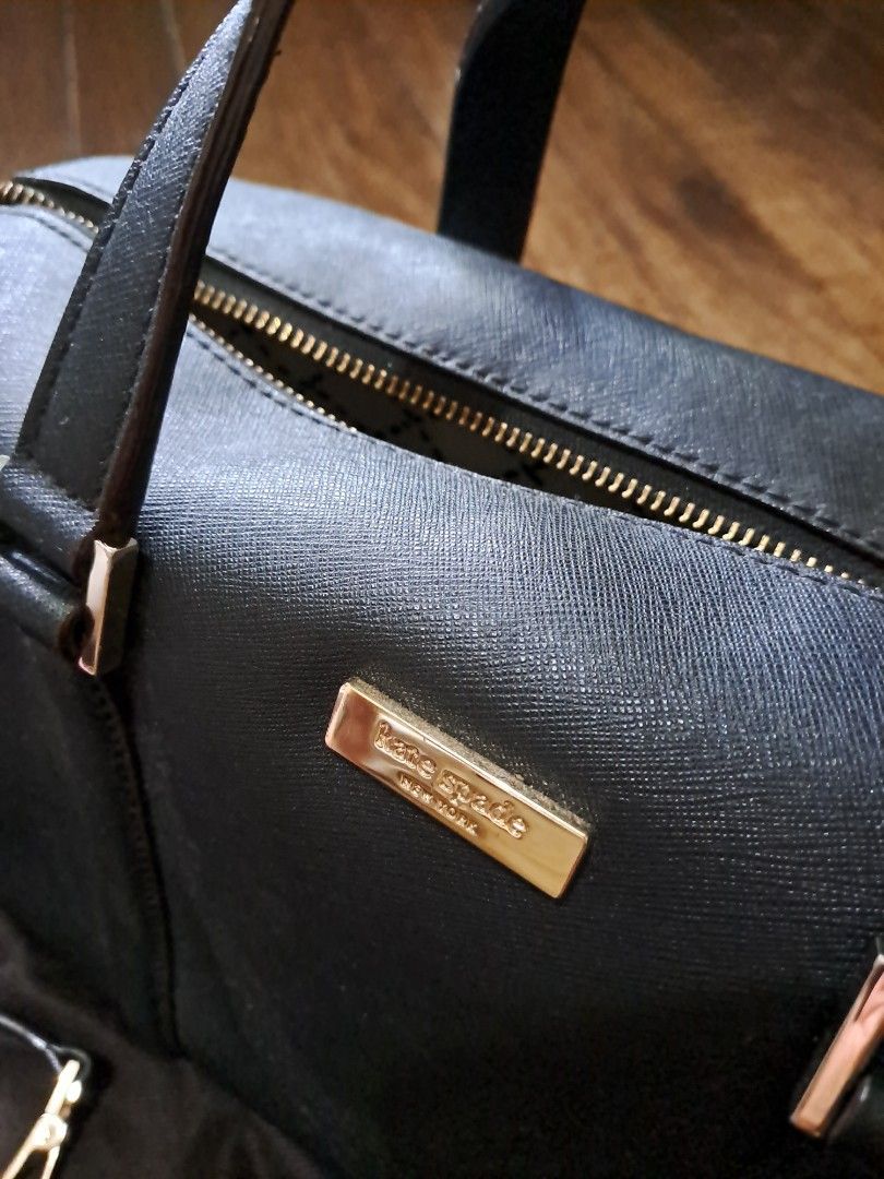 Kate Spade doctor's bag (Category: Luxury Bags & Wallets) located in Pasig City. Submitted by debfallar (Listing ID 1225594022, Image 1). Description: like new. in good condition. made of saffiano leather. gold buckles shiny. with care card and dust bag. well cared for..