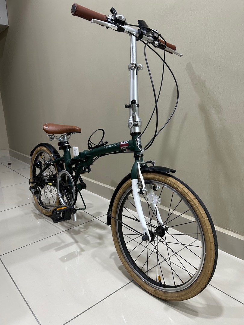 London taxi hotsell folding bike 20