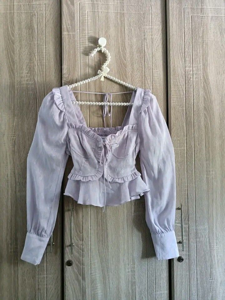 Looking for!!! Puff long sleeve corset top (Category: Blouses) located in Taguig. Submitted by declutter_anon (Listing ID 1225517828, Image 1). Description: Looking for!!! Urban Revivo top same design in the pic xs-s.