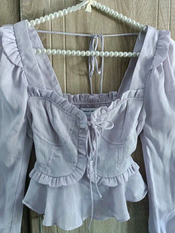 Looking for!!! Puff long sleeve corset top (Category: Blouses) located in Taguig. Submitted by declutter_anon (Listing ID 1225517828, Image 2). Description: Looking for!!! Urban Revivo top same design in the pic xs-s.