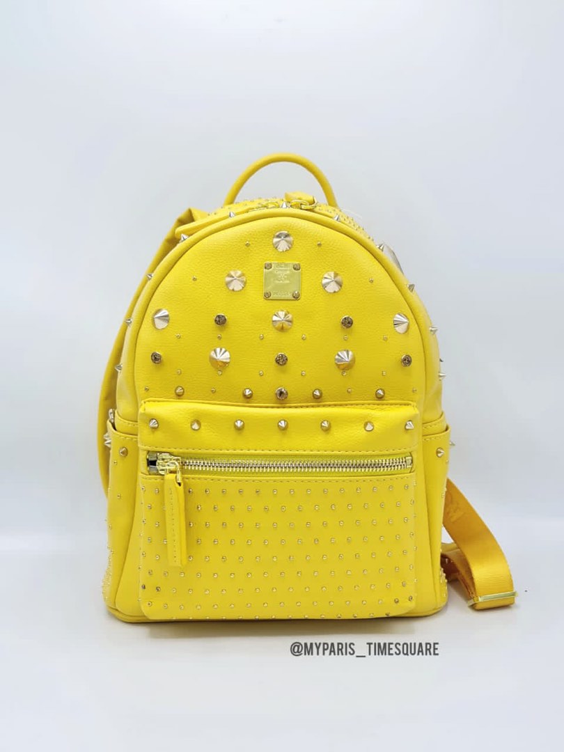 Mcm yellow backpack outlet