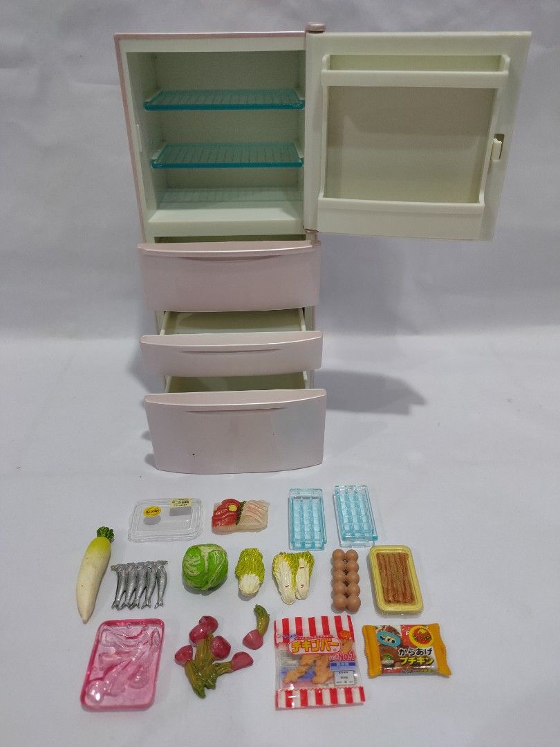 Barbie fridge with food top
