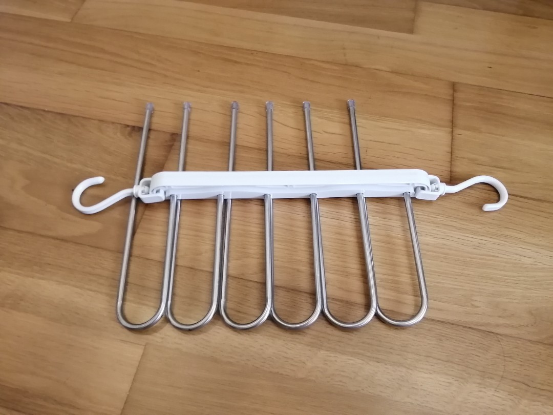 https://media.karousell.com/media/photos/products/2023/4/9/space_saving_hanger_6_bars_1681049132_24374881.jpg