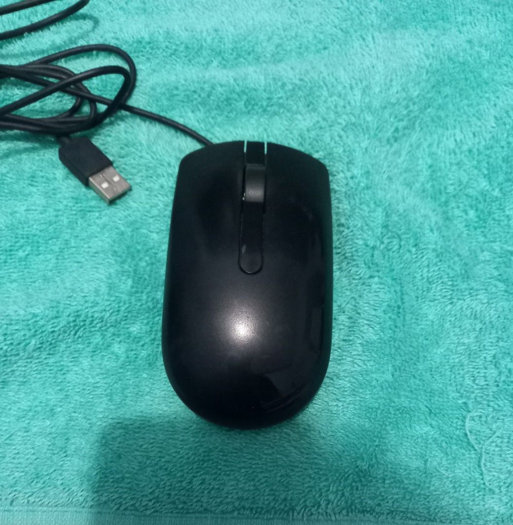 Wired Mouse (Category: Mouse & Mousepads) located in Pasig City. Submitted by vamtang98 (Listing ID 1225573055, Image 2). Description: Wired mouse, plug in USB with scroll wheel RFS: Not being used; decluttering.