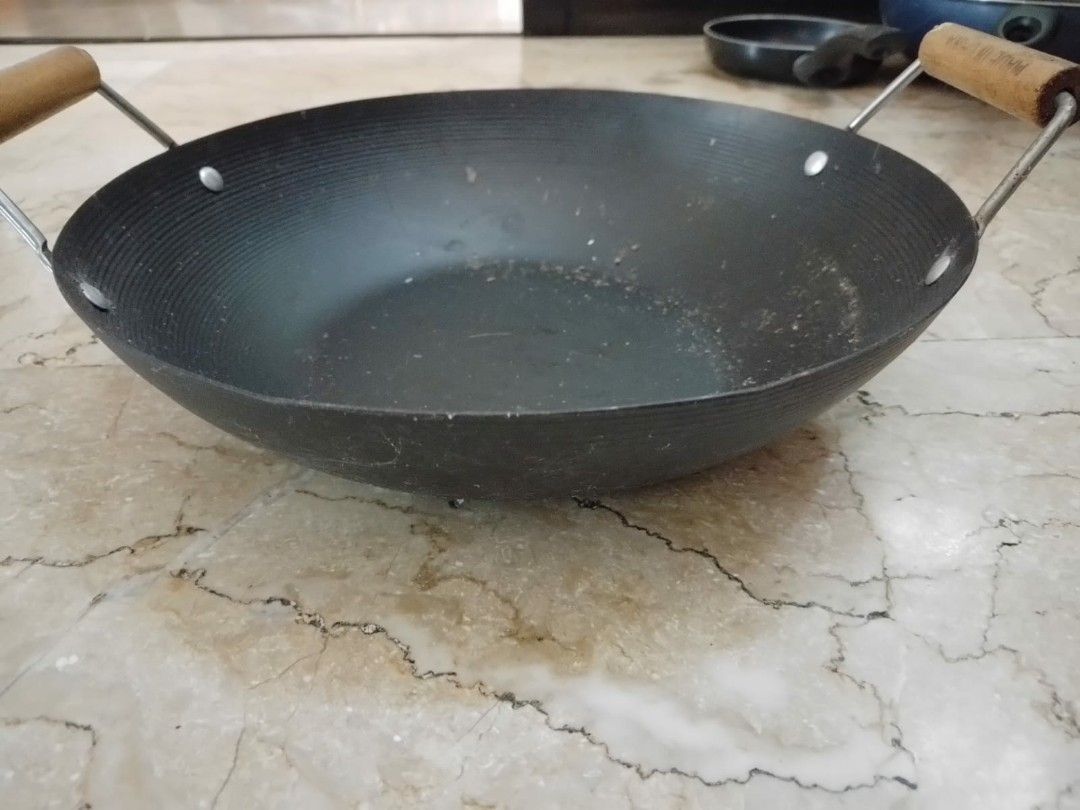 Cast iron wok on Carousell