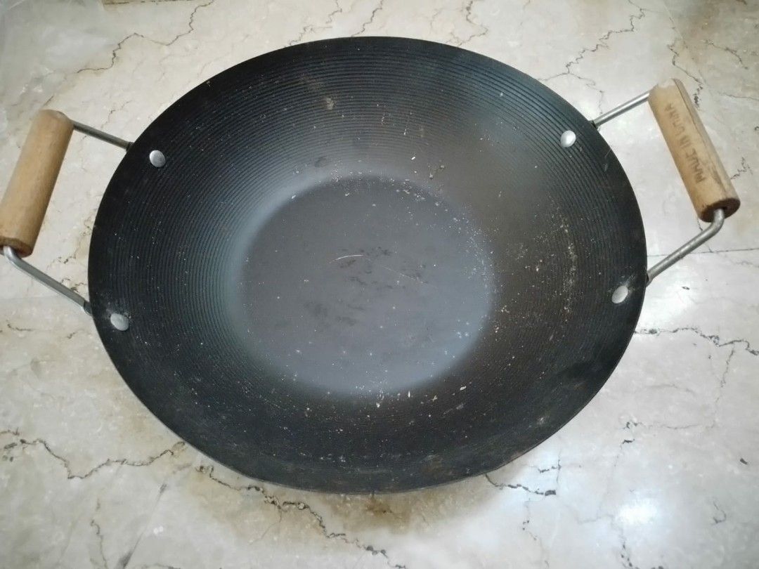 Cast iron wok on Carousell