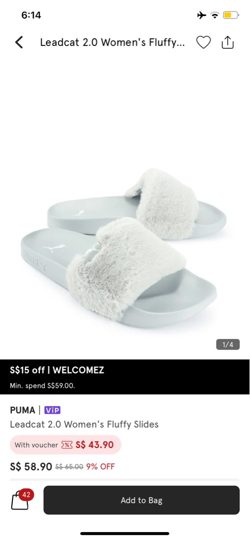 Puma store fluffy slides