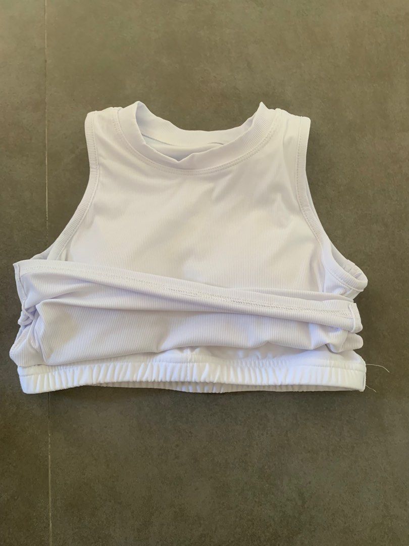 https://www.carousell.sg/p/high-neck-longline-plain-white-crop-top-tank-top-sports-bra-1229486340/