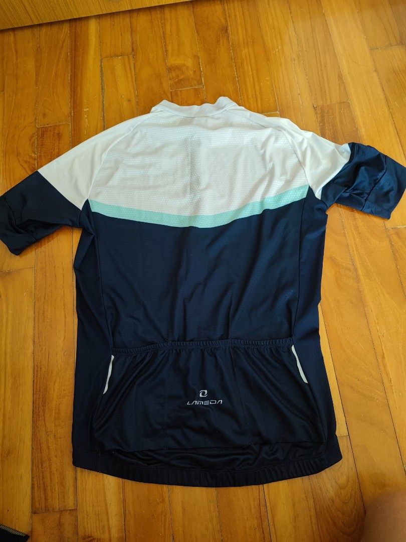 Lambda cycling jersey (Category: Activewear) located in Singapore. Submitted by natoforsale (Listing ID 1229558200, Image 2). Description: Lightly used lambda cycling jersey XL size suitable for 173 to 178cm, 70 to 80 kg #monton.