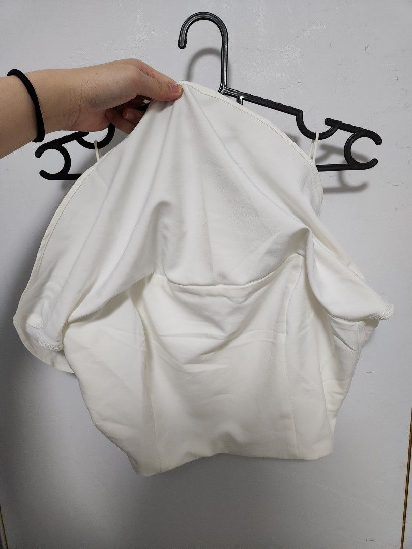 lovet basic flutter top (Category: Blouses) located in Singapore. Submitted by sunwoosun (Listing ID 1229627139, Image 6). Description: washed and tried on only, never worn out. as good as new! - in white colour! - in size L, check 3rd pic for sizing *free mailing.