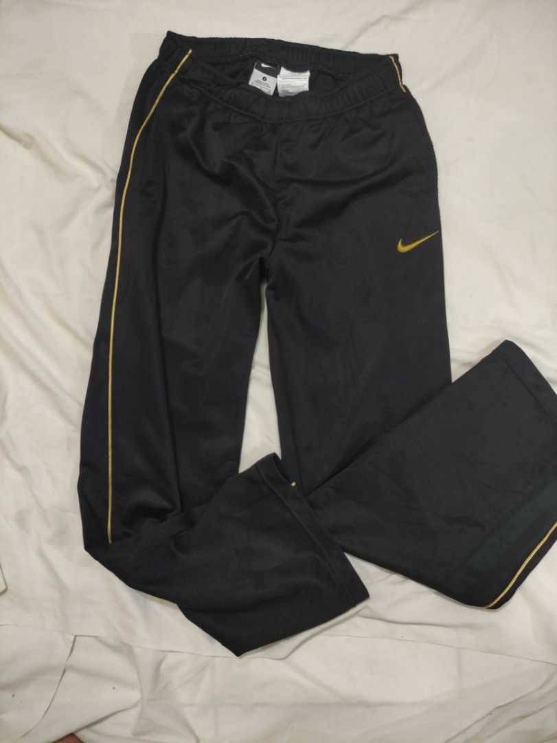 gold and black nike joggers