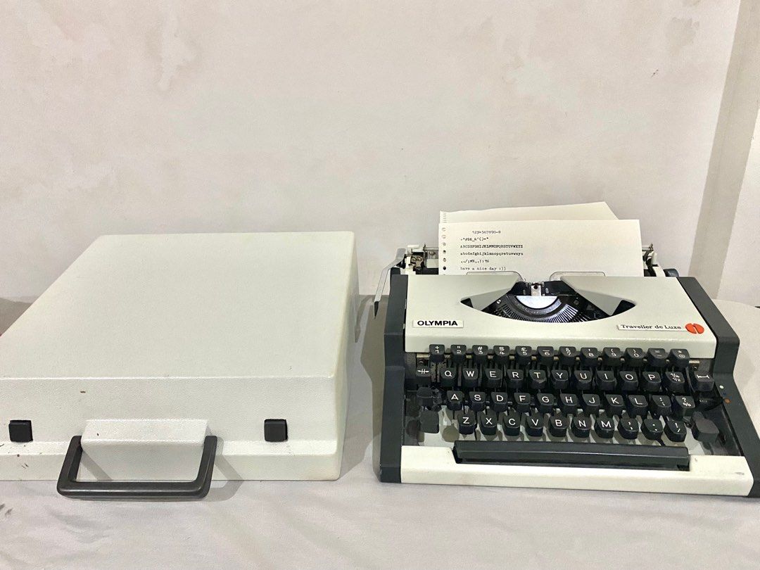 Olympia Traveller de Luxe (Typewriter) (Category: Stationery & School Supplies) located in Baliuag. Submitted by uncannyxgirl (Listing ID 1229606707, Image 2). Description: I bought this online last year for journalling, and it’s in a really good condition. This comes with a case while the typewriter itself has a metal case (very secure). This is almost new cause it was well maintained, gagamitin na lang :)) ✍🏻 ALL KEYS ARE FULLY FUNCTIONING!! ✍
