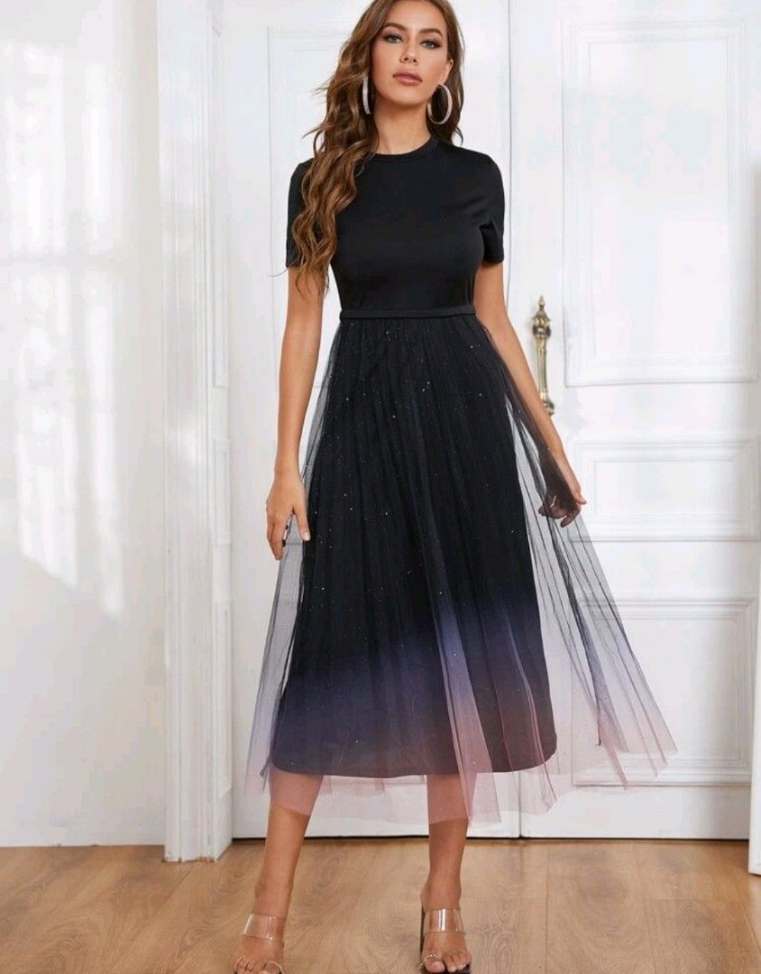 Black dress shop with rainbow pleat