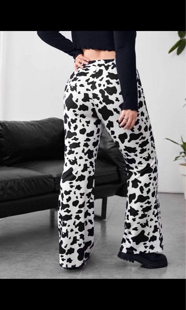Cow print flare pants on sale
