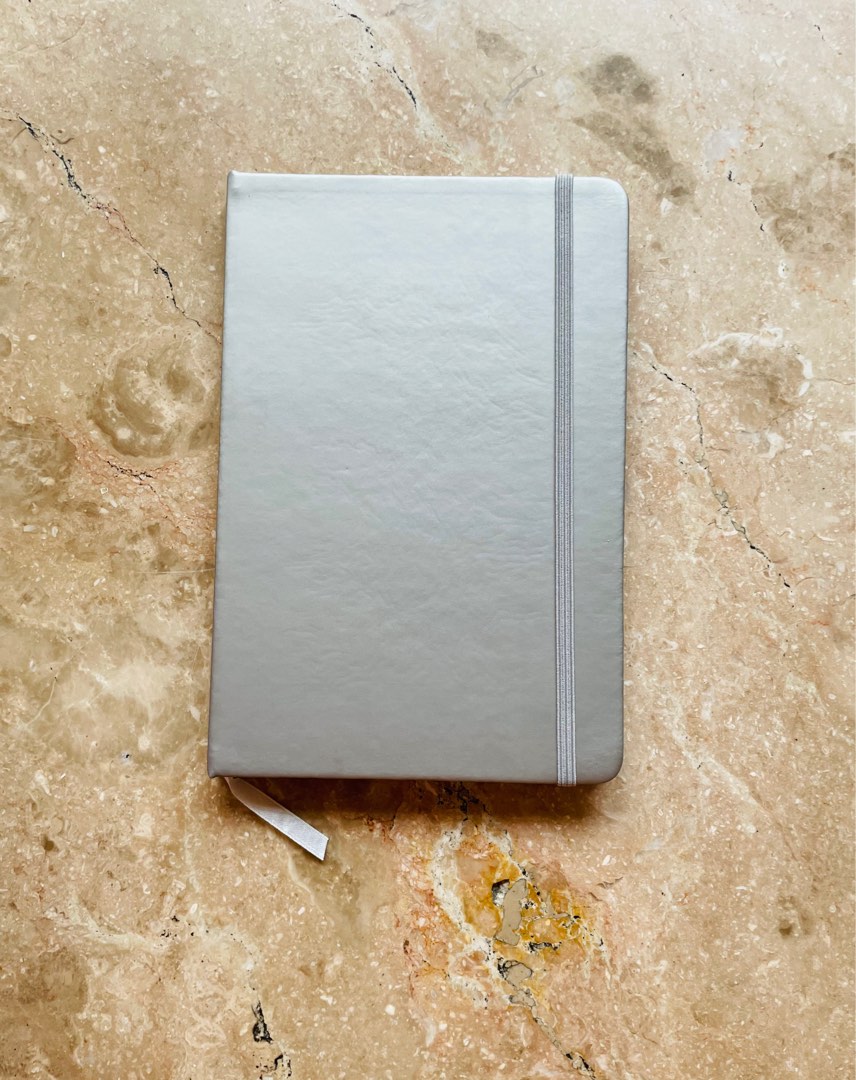 Silver Notebook with Garter Lock on Carousell