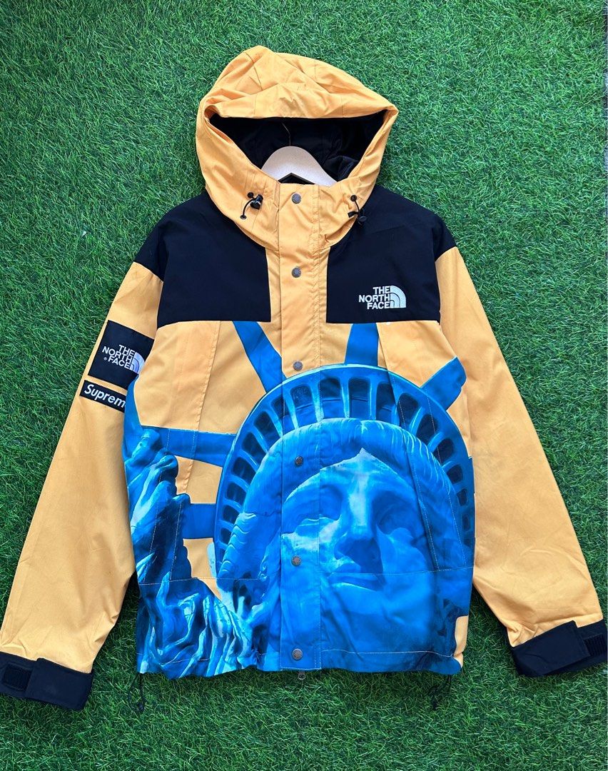 Blue and yellow online north face supreme jacket
