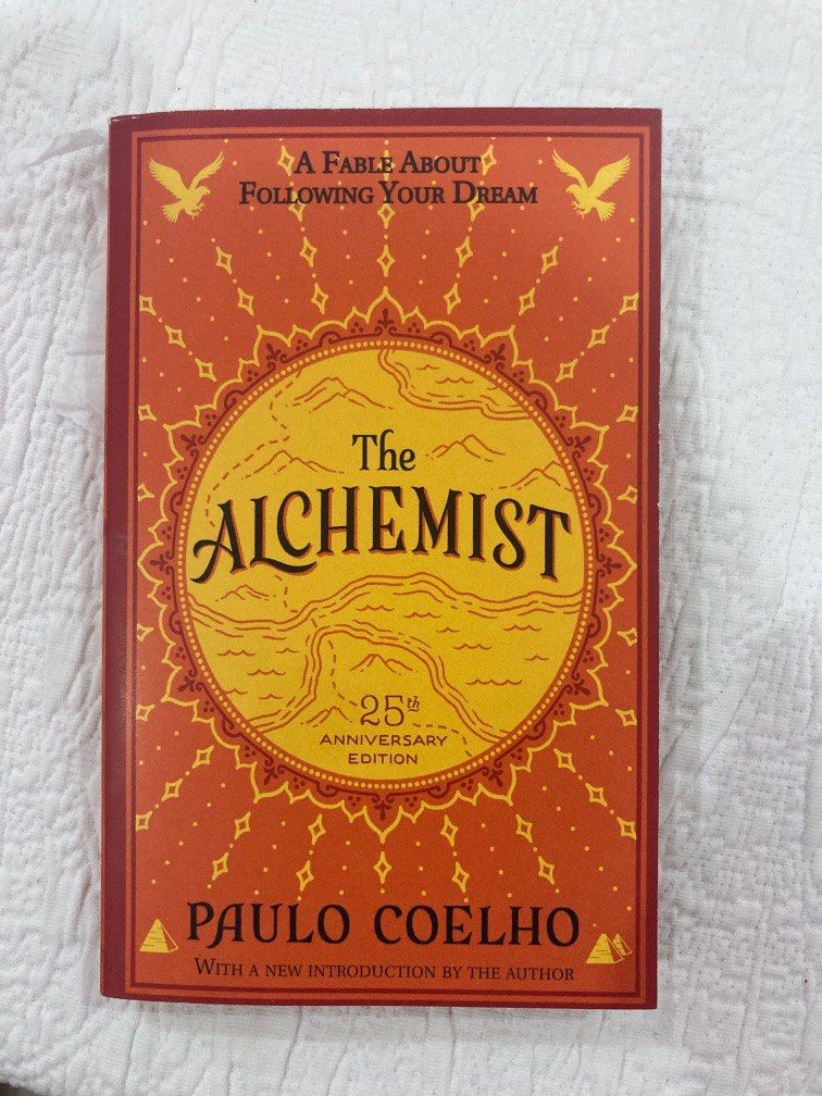 The Alchemist by Paulo Coelho (Category: Storybooks) located in Taguig. Submitted by cluttered.mind (Listing ID 1229617254, Image 1). Description: Never read nor used - dont plan to read it - its just stored - very very minimal flaw which is seen in the last photo - bought from Fully Booked for P399.00 (the tag is still even on it).