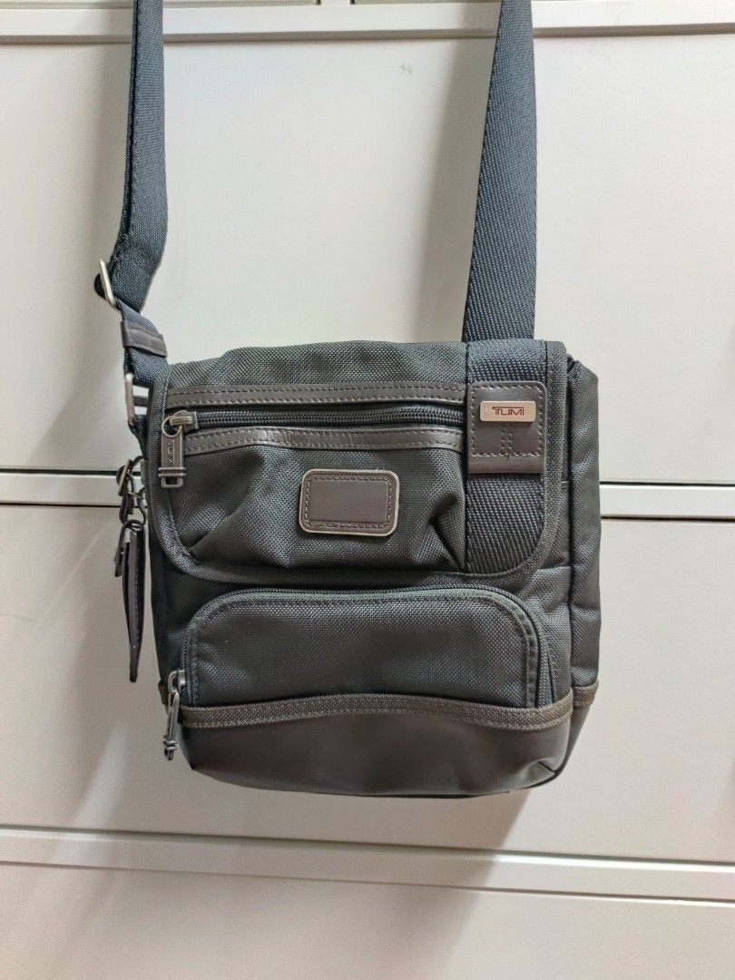 TUMI kerby crossbody used like new