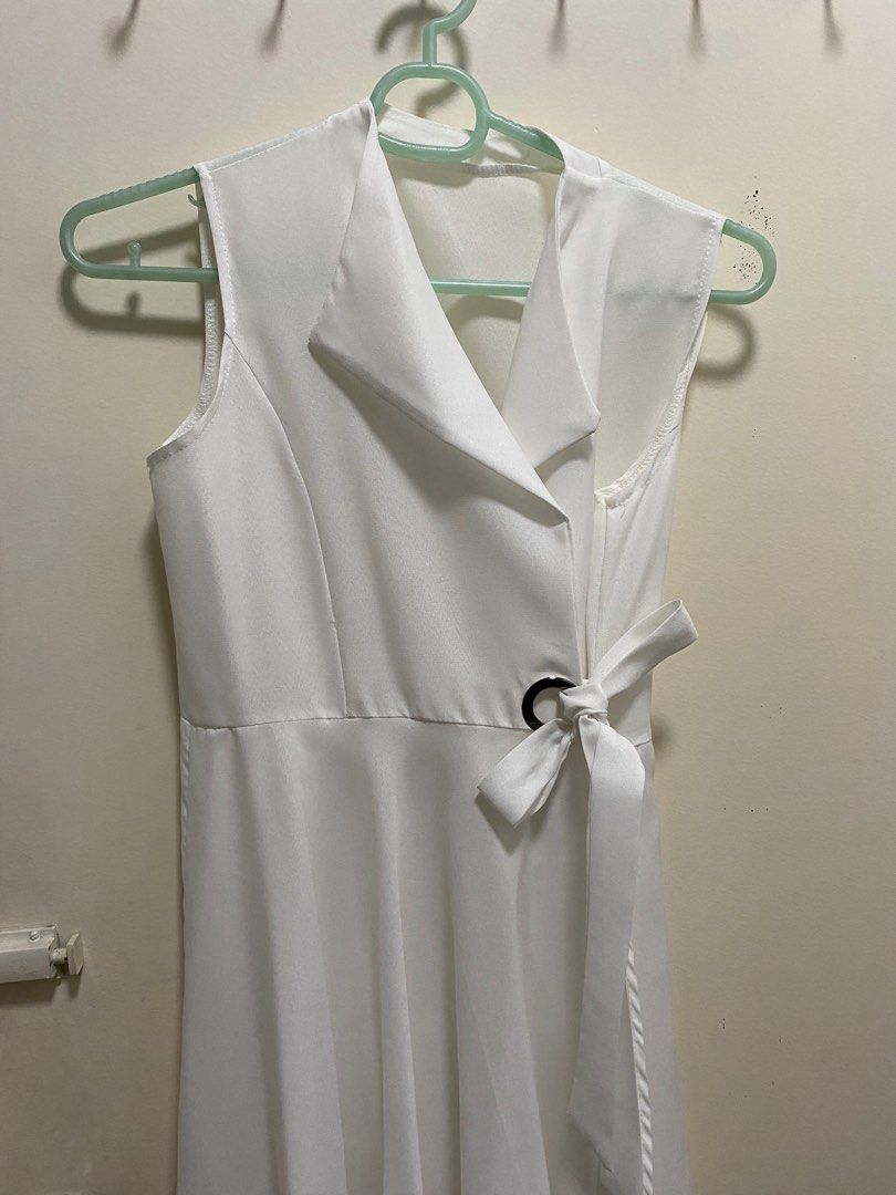 White wrap dress (Category: Dresses) located in Pasay City. Submitted by comcapcom (Listing ID 1229559797, Image 2). Description: .