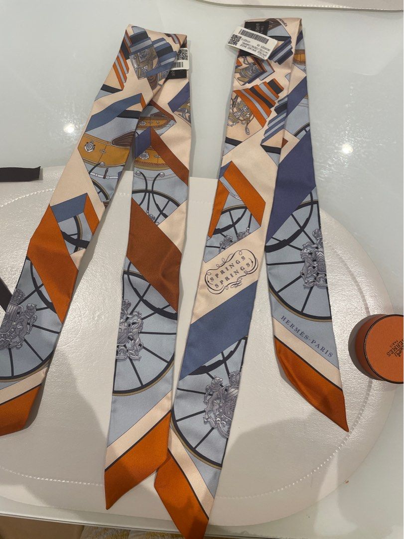 2 pcs Hermes twilly (Category: Luxury Accessories) located in Pasig City. Submitted by lalaandkiki (Listing ID 1202521112, Image 1). Description: Two pcs Didn’t open the other one from box. Store fresh. With tag Complete with copy of receipt. Layaway 0% interest .