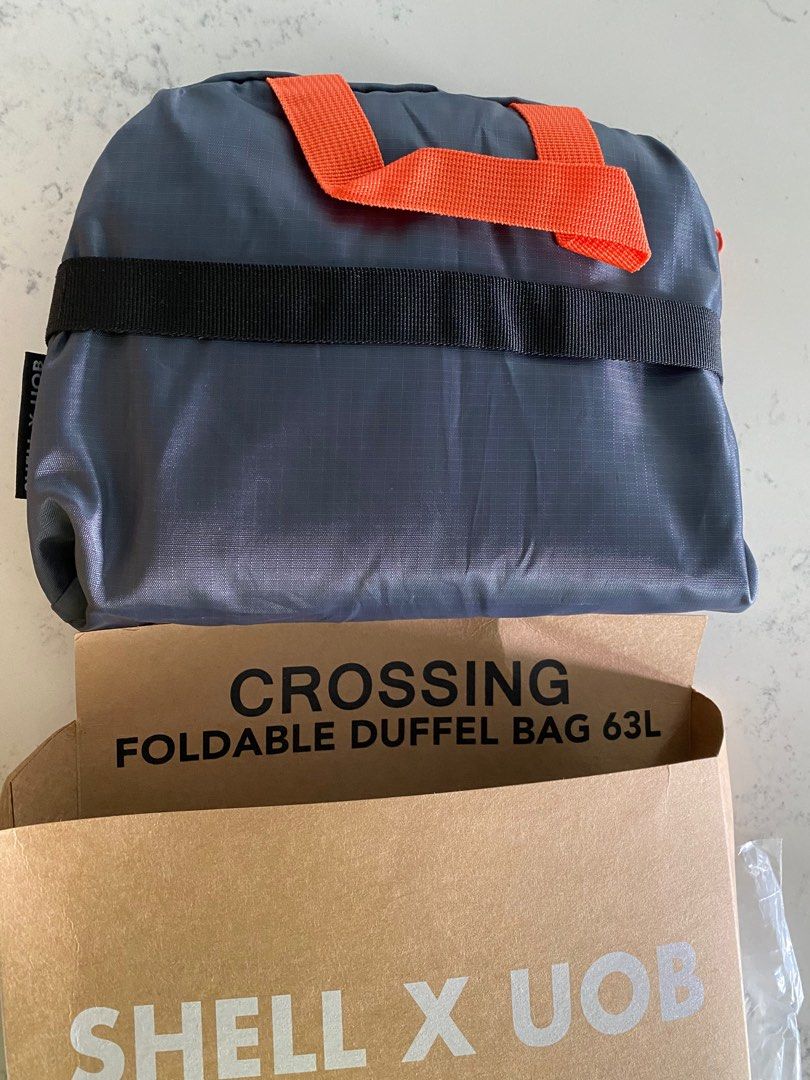 Foldable duffel bag 63L ( shell x UOB), Men's Fashion, Bags, Sling Bags