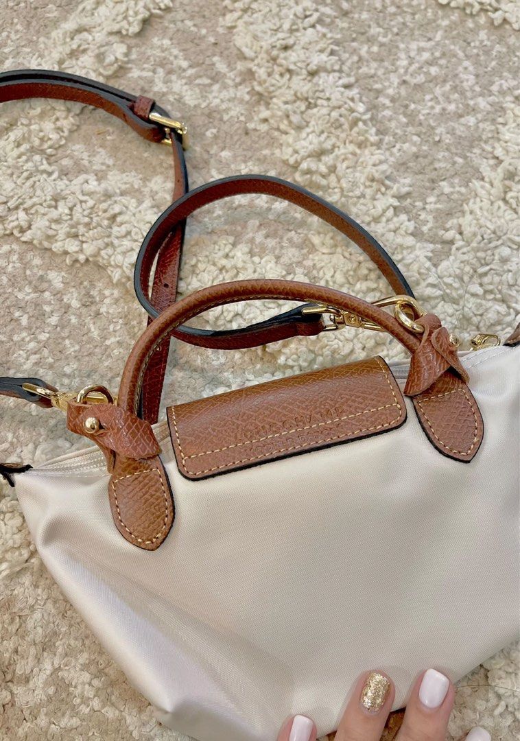 longchamp mini pouch with sling (Category: Luxury Bags & Wallets) located in Cabuyao City. Submitted by luxbymishy (Listing ID 1231187793, Image 2). Description: brand new condition complete inclusions 💯 original .