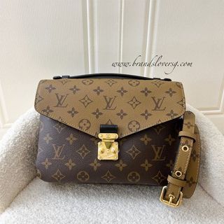 Louis Vuitton Reverse Monogram Triangle Softy, Luxury, Bags & Wallets on  Carousell